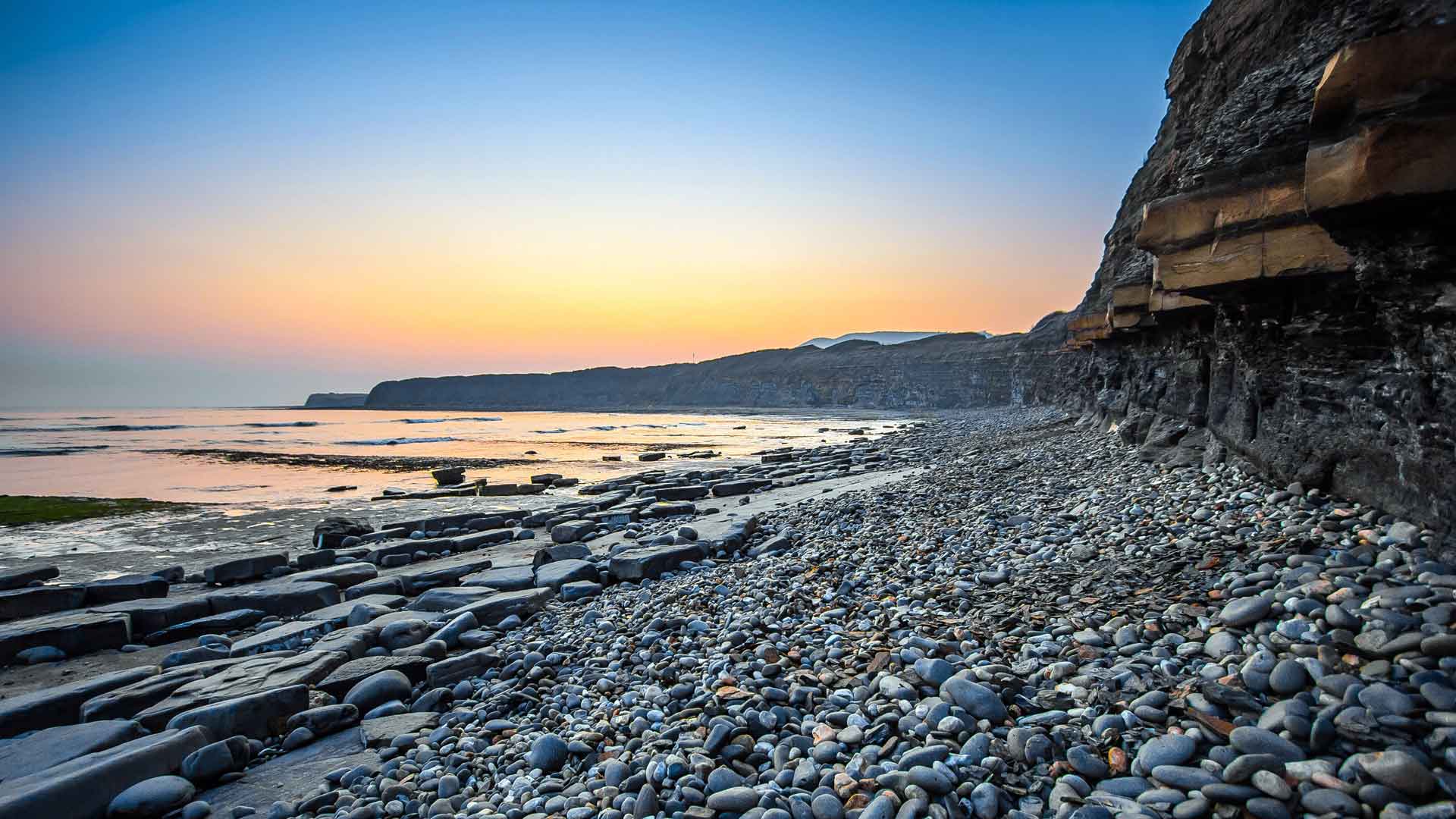 海岸海洋鹅卵石悬崖日落 5K