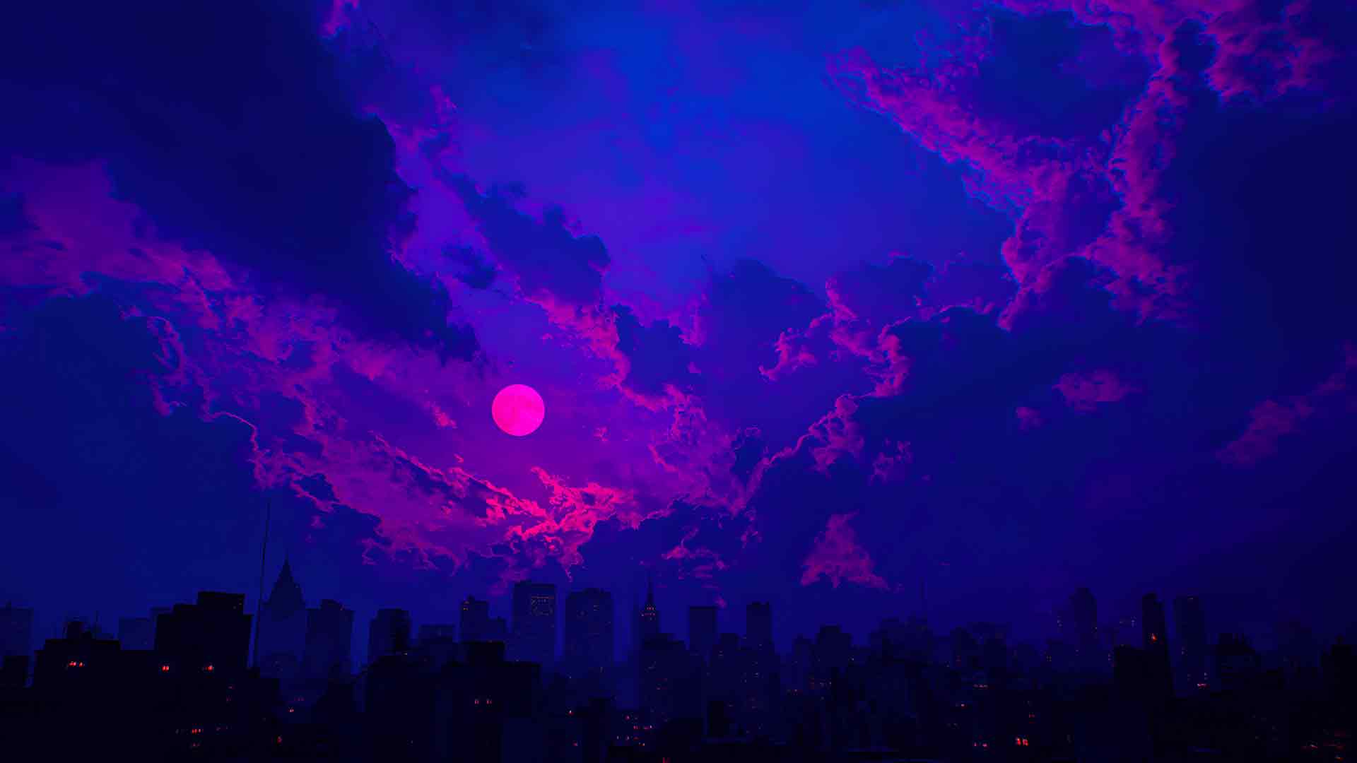 哥谭市霓虹日落天际线桌面壁纸