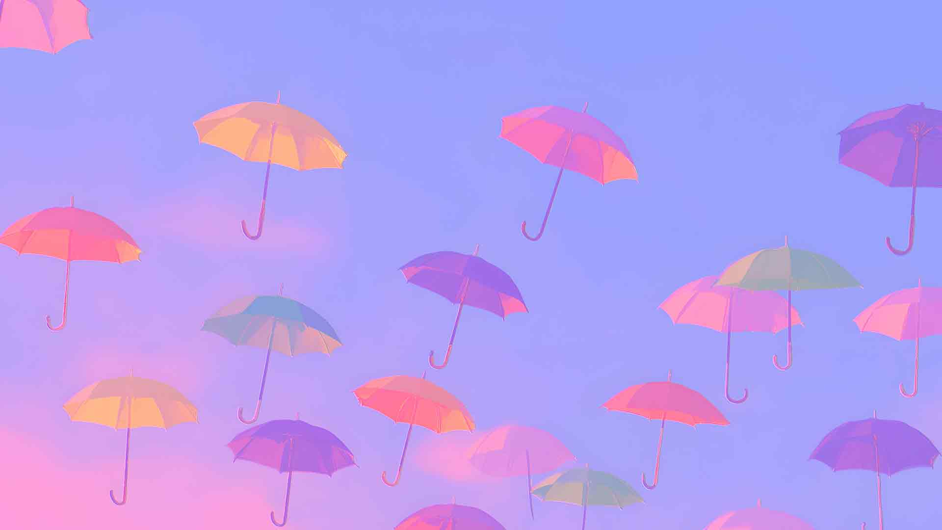 抽象彩色雨伞漂浮在天空中的桌面壁纸